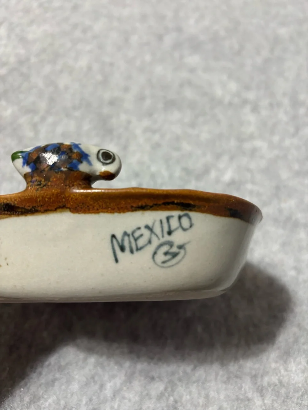 Mexican pottery dish oval ceramic with sun, floral & bird design